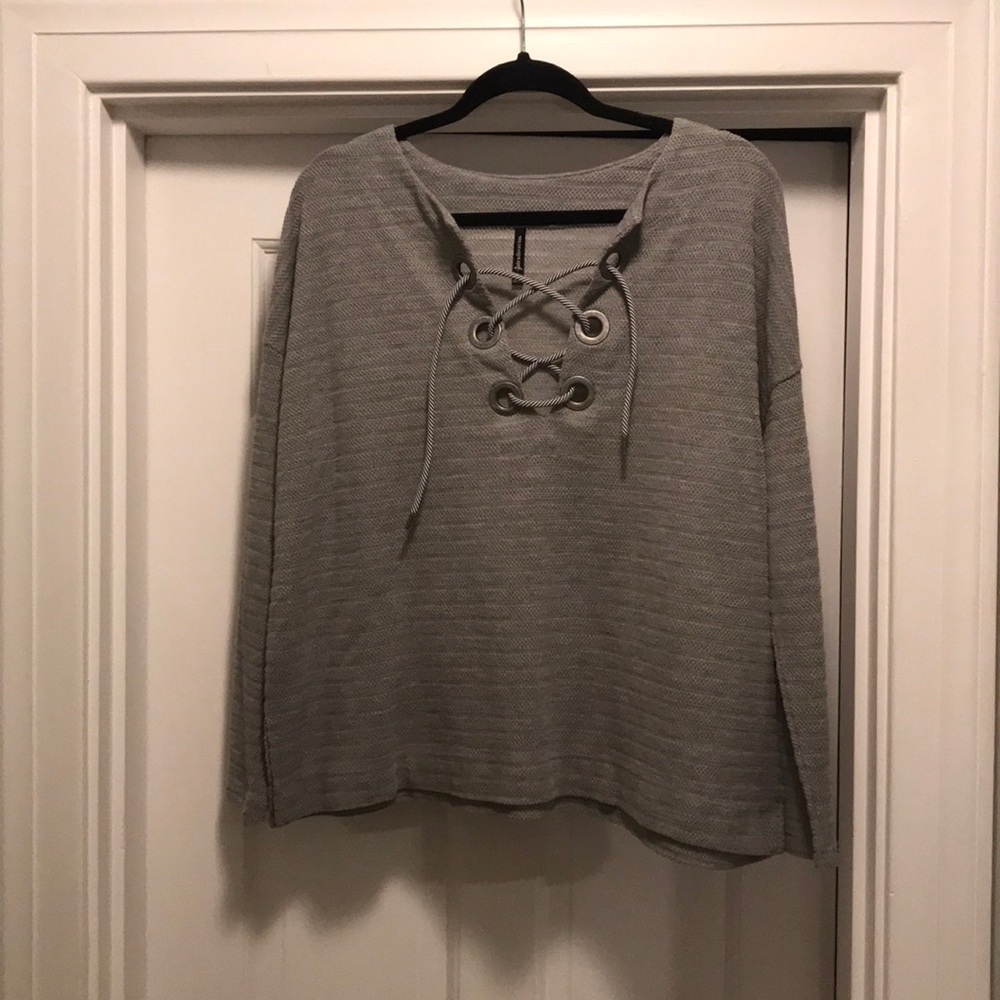 Grey sweater. Size Small.